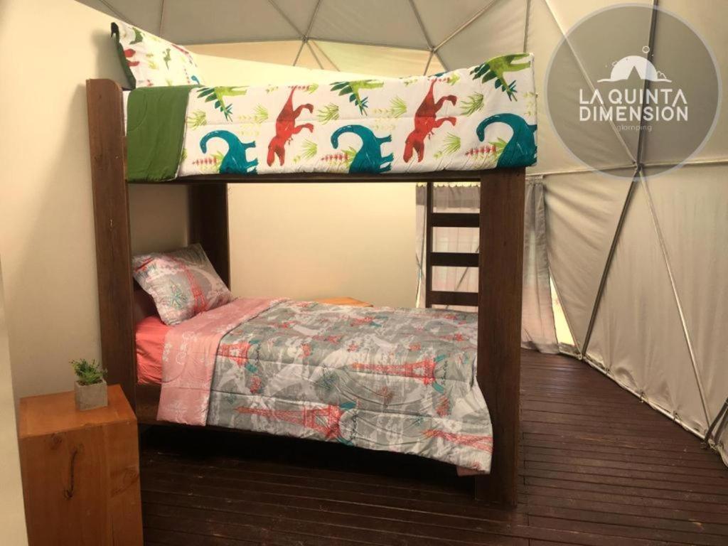 Campo de lujo La Quinta Dimensión Glamping Guatapé
